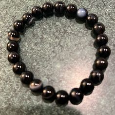 This Stone Brings Courage And Self Confidence While Providing Grounding And Protection Among Other Benefits. Top Quality Stone Casual Agate Jewelry, Casual Agate Beaded Jewelry, Casual Round Agate Crystal Bracelet, Casual Round Crystal Agate Bracelet, Casual Agate Bead Jewelry, Casual Agate Crystal Bracelet, Casual Agate Round Beads Jewelry, Black Agate Jewelry For Healing, Black Agate Healing Jewelry