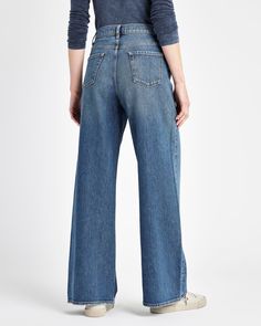 Keep it cool in our Palazzo Jean. These relaxed, wide leg jeans feel like classic denim and can be styled with a tee and slides, or sweaters and boots. We love the vintage-inspired fading for added style. 1% Elastane, 99% Cotton Iconic 5-pocket design Medium wash Wide leg Fading details Keep Cool, Pocket Design, Wide Leg Jeans, Leg Jeans, Slides, Vintage Inspired, Wide Leg, Boots, Design