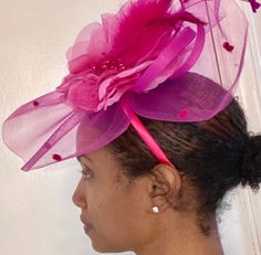 Pink flower fascinator with headband Sure to make a statement when walking in any building! Shipping time 3-7 days Unisex hat Also comes with head band that be taken off Made of polyester and cotton This isa small to medium size hat Hat is custom All sales final Last call item Pink Party Fascinator With Short Brim, Pink Elegant Flat Brim Fascinator, Pink Adjustable Fascinator, Adjustable Pink Flower Fascinator, Pink Hat-shaped Fascinator As Gift, Headband Fascinator, Pink Fascinator, Black Fedora, Mini Hats