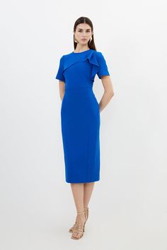 {@@=Ist.Core.Helpers.StringHelper.ToProperCase("A classic straight midi dress is elevated with ruffle detailing along a round neck and short sleeves. Tailored with premium crepe and cut with a pencil fit, pair with golden heels and accessories for a sophisticated ensemble.Round neckRuffle detailingShort sleevesExpertly designed for those 5'3" and under, our Petite pieces are perfectly proportioned for a smaller frame using shorter lengths.")} Office Sheath Midi Dress With Ruffles, Midi-length Ruffled Bodycon Dress For Work, Ruffled Midi Bodycon Dress For Work, Elegant Ruffled Bodycon Office Dress, Midi Bodycon Dress With Ruffles For Work, Short Sleeve Ruffled Dresses For Office, Knee-length Ruffled Midi Dress For Work, Knee-length Midi Dress With Ruffles For Work, Knee-length Ruffled Bodycon Dress For Work