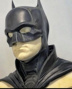 the batman mask is made from black leather