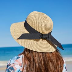 This lightweight sun hat is brimming with UPF 50+ sun protection. One size fits most and includes an internal adjustable drawstring to capture the perfect fit. A charming sun smart choice for everyday outings to special occasions! Made from a paper/polyester blend. Adjustable Packable Sun Hat For Beach Season, Adjustable Packable Sun Hat For Beach, Packable Summer Sun Hat For Day Out, Adjustable Packable Sun Hat For Sunbathing, Packable Sun Hat For Beach, Adjustable Sun Hat With Upf 50+ For Day Out, Adjustable Bucket Sun Hat For Day Out, Adjustable Lightweight Straw Hat For Sunbathing, Packable Sun Hat For Beach And Spring