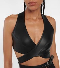 Leather crop top in black - Alaia | Mytheresa Chic Leather Crop Top, Fitted Leather Crop Top, Fitted Leather Crop Top For Night Out, Sleek Fitted Crop Top For Evening, Sleek Fitted Cropped Top, Modern Fitted Crop Top For Night Out, Fitted Modern Crop Top For Night Out, Sleek Party Crop Top, Leather Crop Top Outfit