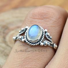 Rainbow Moonstone Ring ~ Moonstone Ring ~ Oval Moonstone Ring ~ Moonstone Stacking Ring ~ Filled Moonstone Ring ~boho silver ring for girl's ~ Free Shipping *Main Stone : Rainbow Moonstone *Main Stone Color : White * Main Stone Size :- 6 x 8 mm Approx. *Metal : Sterling Silver *Base Metal : 925 parts per 1000 *Style : Ring What Are The Benefits of Silver Jewelry Silver has a long history in antibiotics and sterilization, with many women and men wearing silver jewelry to stave off infection, cold/flu symptoms, and any other virus, bacteria, etc. This health benefit is one of the reasons why so many manufacturers choose to make medical devices and tools out of silver. Silver also helps with internal heat regulation and circulation. Many have reported improvements in energy levels and balance Handmade Bohemian Oval Moonstone Ring, Bohemian Moonstone Crystal Ring With Birthstone, Adjustable Oval Moonstone Bohemian Ring, Bohemian Oval Moonstone Ring, Bohemian Moonstone Birthstone Promise Ring, Bohemian Moon Shaped Gemstone Ring, Bohemian Adjustable Moonstone Birthstone Ring, Bohemian Sterling Silver Oval Cabochon Moonstone Ring, Handmade Bohemian Moonstone Ring In Moon Shape