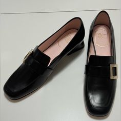 Roger Vivier Viv Rangers Leather Buckle Heeled Loafers, Black, Size 39.5. New In Box. Might Have Some Minor Scratches On The Smooth Leather. Not Very Noticeable. Please Refer To The Pictures Elegant Square Toe Loafers For Office, Formal Slip-on Court Shoes With Flat Heel, Formal Low Heel Calf Leather Loafers, Formal Calf Leather Loafers With Low Heel, Elegant Square Toe Slip-on Flats, Elegant Office Loafers With Low Heel, Square Toe Calf Leather Loafers For Office, Office Low Heel Calf Leather Loafers, Office Square Toe Calf Leather Loafers