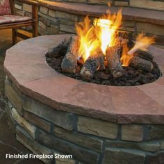 a fire pit sitting on top of a stone patio