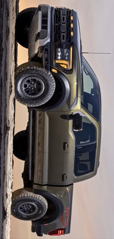 the front end of a truck with its wheels off