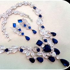 This Breathtaking Blue Sapphire Bridal Necklace And Earring Set Will Add Red Carpet Glamor To Your Wedding Ensemble. This Lavish Jewelry Set Is For The Bride Who Loves Attention Getting, Head-Turning Bling In A Luxury Design! Gala Jewelry, Capricorn Pendant, Aquarius Pendant, Chain Link Necklace Silver, Vintage Rhinestone Necklace, Rustic Necklace, Egyptian Style, Historical Jewellery, Anchor Necklace