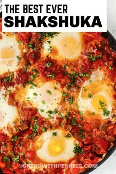 the best ever shakshuka recipe in a skillet with eggs on top