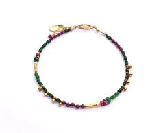 Gold Fill Bracelet with 18K Vermeil, Ruby, Emerald, Ruby Zoisite 7.13" Chipita uses rare vintage beads, precious, and semi-precious gemstones in their work. There may be some color variation in the stones they use and due to the nature of vintage beads, there may be some design variation. We'll be in contact asap if the piece you ordered varies from what's photographed. Handmade Yellow Gold Bohemian Beaded Bracelets, Spiritual Handmade Yellow Gold Beaded Bracelets, Handmade Bohemian Yellow Gold Beaded Bracelets, Beaded Bracelets With Natural Stones In Gold, Gold Tourmaline Bracelet Jewelry, Gold Tourmaline Bracelet, Tourmaline Gemstone Beaded Bracelets With Round Beads, Handmade Yellow Gold Fusion Bracelets, Tourmaline Natural Stones Bracelets As Gift