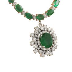 Stamped: 14KTotal Necklace Weight: 28 GramsNecklace Length: 18 InchesCenter Emerald Weight: 3.38 Carat (11.00x9.00 Millimeters)Side Emerald weight: 22.60 Carat (6.00x4.00 Millimeters)Diamond Weight: 3.98 Carat (F-G Color, VS2-SI1 Clarity) Face Measures: 21.70x21.85 MillimetersSKU: [600840] Dazzling Formal Emerald Gemstone Necklace, Formal Emerald Necklace With Brilliant Cut, Formal White Gold Pear-shaped Emerald Necklace, Hand-set Emerald Pendant Necklace For Formal Occasions, Hand Set Emerald Pendant Necklace For Formal Occasions, Formal Brilliant Cut Emerald Pendant Necklace, Formal White Gold Emerald Necklace, Oval Hallmarked Diamond Necklace In Fine Jewelry Style, Hallmarked Oval Diamond Necklace In Fine Jewelry Style