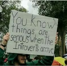 a person holding up a sign that says you know things are serious when the infovertists arrive