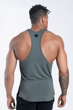 Model Specs: Casey is 5'11", 190lbs, and is wearing a Medium (TLF TACTIC PERFORMANCE BAMBOO TANK) Unequalled fit, style, performance, and comfort The low-cut racerback design provides a higher level of comfort and allows you to move freely Superior design provides the perfect muscle enhancing fit Contrasting chest logo and rear punched out upper center back logo Curved hem with side seam vents for added style Ultra-soft and light weight fabric for superior feel and comfort Fabric: Rayon from Bam Active Wear Fashion, Mens Gym Fashion, Bamboo Tank, Tlf Apparel, Mens Yoga Clothes, Guys Fashion, Men Tattoos, Sleeve Ideas, Hairstyles Men