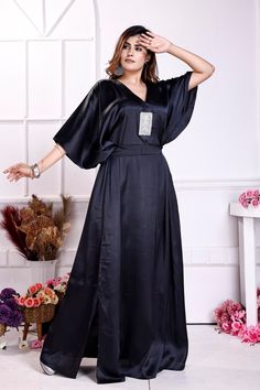 "Step into refined elegance with our black embellished kaftan, a fusion of intricate detailing and graceful design. Perfect for adding a touch of sophistication to any occasion, this versatile piece effortlessly combines comfort with glamour. Buy with confidence, We Sell Best Quality Silk kaftan You Never Found These Designs elsewhere ------------------------------- One Size Fits All (Small to 8XL) Fabric :- Satin Available Length Kaftan 60” (152.4cm) from shoulder to hem, -Matching waist belt - Elegant Embellished Maxi Dress For Eid, Elegant Embellished Kaftan For Formal Occasions, Formal Embellished Kaftan, Elegant Embellished Kaftan For Festive Occasions, Elegant Embellished Formal Kaftan, Formal Embellished Festive Kaftan, Elegant Maxi Length Party Kaftan, Formal Festive Embellished Kaftan, Black Abaya For Eid Festive Occasion