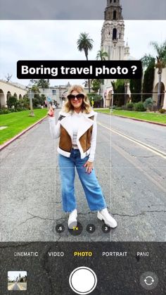 a woman taking a selfie in front of a building with the caption boring travel photo?