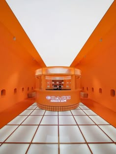 an orange and white room with tiled floors