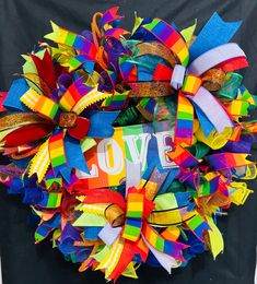 a colorful wreath with the word love on it