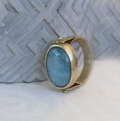 "A unique piece of gemstone ring made elegant with a natural Aquamarine stone, set in bezel of 14k yellow gold fill. A gold ring that has a touch of both classic and modern style. A 14k ring that will suit for everyday use and easy to incorporate into your casual, formal and boho looks. Wear and style with other stackable rings for women and create your own jewelry combinations. Product Details: --------------------- Ring Size: Please select from the drop-down menu. Ring width: 0.19\"/ 4.7mm Sto Oval Aquamarine Promise Ring, Oval Aquamarine Crystal Ring With Gemstone, Jewelry Combinations, Gold Rings For Women, Rings Oval, March Birthstone Ring, Oval Engagement Ring, Oval Engagement, Aquamarine Ring