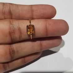 14k solid rose gold natural AAA quality emerald cut rectangular shaped citrine semi precious gemstone ring. 1. The weight of the natural citrine gemstone used in the ring =1.10 cts. 2. The weight of 14k solid rose gold used in the ring =1.130 grms. 3. The design of the ring is very nice and beautiful. 4. I have used all my skills and experience to manufacture this ring as beautiful as I can and I do hope my work will be appreciated. Thanks S Ring, Golden Ring, Tourmaline Stone, Citrine Stone, Natural Citrine, Citrine Gemstone, Tourmaline Gemstone, Ring Ideas, Natural Emerald