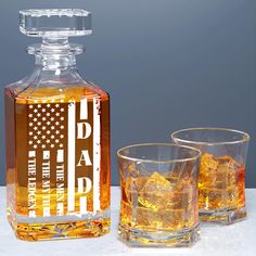 an american flag decanter next to two shot glasses