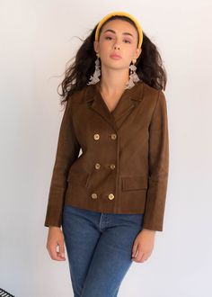 "Vintage 60s Mod suede jacket. Subtle suede double-breasted jacket in a chocolate brown. Notched lapel. Long sleeves. Front flap pockets. Boxy silhouette. Decorative Mod square front button fastening. Fully lined. We kindly ask that you please view all measurements for comparison so you can get your desired fit. Made in Spain. * Brand: Maema, Madrid * Decade: 1960s * Fabric: Suede * Lining: Acetate * Color: Chocolate Brown C O N D I T I O N Excellent vintage condition, minimal pre-wear; no major Brown Double-breasted Blazer With Lapel Collar, Brown Double-breasted Blazer With Buttons, Brown Double-breasted Blazer For Fall, Chic Brown Single-breasted Pea Coat, Brown Leather Jacket With Double Button For Work, Brown Leather Jacket For Work, Brown Pea Coat With Button Closure For Work, Brown Pea Coat For Work, Chic Brown Double-breasted Pea Coat