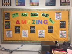 a bulletin board with the words you are amazing on it in front of a classroom wall