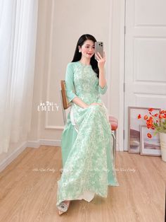 🌻This Set includes 1 long dress 🌻Material: Voan silk , double layers      Stretchy level: 1/10 🌻 The measurement of this ao dai (long dress) is in Vietnamese size (American size tends to be bigger for the same size). Please LOOK AT THE SIZE CHART CAREFULLY BEFORE ORDERING. There might have some chalk writings on the fabric due to making process. These marks can be washed away easily. 🌻🌻No returns or exchanges Buyer can contact seller about any issues with an order. 🌸 Follow us Facebook/aodaiemily www.aodaiemily.com 💜 Thank you very much!💜 Traditional Summer Ao Dai For Weddings, Traditional Ao Dai For Summer Wedding, Traditional Summer Wedding Ao Dai, Fitted Long Sleeve Cheongsam For Summer, Traditional Long Ao Dai For Summer, Elegant Long Ao Dai For Summer, Traditional Fitted Ao Dai For Summer, Green Floor-length Sets For Spring, Green Floor-length Spring Sets