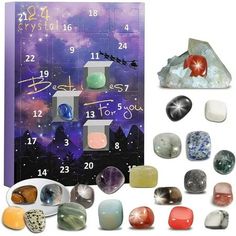 an assortment of rocks and crystals in front of a calendar