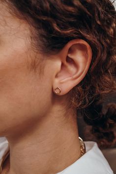 These earrings are simple, modern and beautiful. Try pairing them with the Twist Open Circle Studs! Choose a PAIR of studs or a SINGLE stud at checkout. The REGULAR size measures around 1/4″ in diameter.Each stud earring comes with an ear nut backing. Choose from 14K GOLD FILL, 14K ROSE GOLD FILL, or STERLING SILVER. Each Open Circle stud earring is individually shaped by hand for a beautiful hand-crafted, high-quality earring. First, we solder a small circle to an ear wire post. Then we polish Rose Gold Circle, Simple Gold Earrings, Circle Stud Earrings, Mini Twists, Twisted Metal, Circle Earrings Studs, Earrings Simple, Circle Studs, Sell Gold