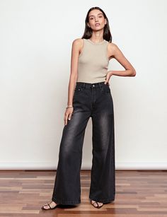 FINAL SALEBlack washed denim high-waisted jeans with wide leg . Brand Pixie Market 100% cotton denimBaggy fit High waist Wide leg Size S waist 26.5", hips 36.5"Size M waist 28.5", hips 38.5"Size L waist 30.5", hips 40.5'"Length 42"Model is wearing a size small and model's height is 5.9/ 175 cm