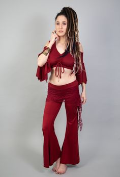 "Leggings for Women, Red Pants, Skirt over Leggings, Boho Festival Fashion, Yoga Pants, Bellydance Pants, Lace Leggings, Bell Bottom Pants. Red skirt over leggings pants for women with Bellydance style. These boho-hippie pants are wonderful for all dance and movement as well as tribal fusion and Bellydance, for burning man and other festival outfits, and many more occasions. ❀ Features: ✓ Made from comfortable and elastic 95% Viscose lycra and 5% cotton fabric ✓ Viscose fabric made from tree pul Fitted Harem Bottoms For Dance, Hippie High-waisted Fitted Pants, Fitted Bottoms For Dance Festival, Fitted Flare Hippie Pants, Bohemian Fitted Pants For Party, Hippie Style Flare Fitted Pants, Hippie Fitted Bottoms For Festivals, Fitted Hippie Party Pants, Stretch Harem Pants For Festivals