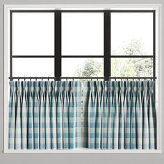 a window with blue and white checkered curtains