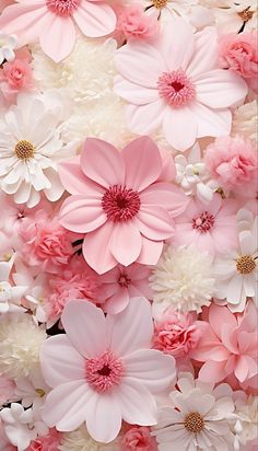 pink and white flowers are arranged together in the shape of a wallpaper or background