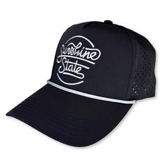 Our Sunshine State Script performance rope hat is lightweight, super breathable and the laser-perforated airflow makes it an ideal hat for warmer temperatures. The fit is just right for all. Our limited first run is available in black with grey embroidery. Performance poly fabric, five-panel design Laser-perforated side and back panels enhance airflow Woven grey rope along base of front panel Adjustable plastic snap closure - Part of the proceeds from the sale of this hat go to organizations tha Functional Black Beach Hat, Black Sports Sun Hat With Curved Brim, Outdoor Black Snapback Sun Hat, Black Breathable Sun Hat For Sports, Lightweight Flat Brim Sports Hats, Black Cap With Upf 50+, Casual Black Breathable Sun Hat, Black Adjustable Hat With Uv Protection, Black Hat With Uv Protection And Adjustable Fit