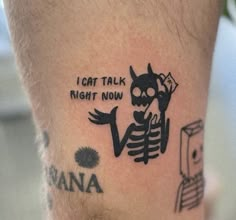 a man with a tattoo on his leg that says i can't talk right now