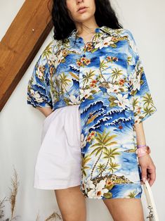 Vintage Y2K 00s blue tropical Hawaii oversized shirt top Shirt is in great vintage condition. Model usually wears UK 10-12 / S-M / US 6-8. Item could fit UK 12-16 / ONE SIZE. Check the measurements before buying. MEASUREMENTS: bust - 140 cm, length - 78 cm. Item made from 100% viscose. Care delicate. Color may differ slightly depending on the color calibration of the device you're viewing on. If You have more questions about products or shipping, please drop me a message. Wish You great shopping, Mellina Oversized Casual Camp Shirt For Summer, Oversized Camp Collar Tops For Summer, Oversized Collared Summer Camp Shirt, Oversized Collared Camp Shirt For Summer, Oversized Printed Summer Shirt, Summer Oversized Printed Shirt, Oversized Floral Print Shirt For Summer, Oversized Short Sleeve Summer Shirt, Oversized Blue Blouse For Vacation