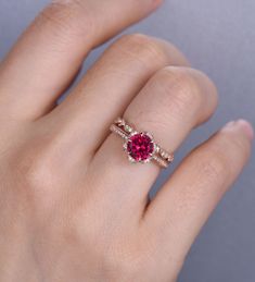 Ruby Ring Ruby Engagement Ring Dainty CZ Diamond Stacking Ring July Birthstone 14K Rose Gold Round Cut Ruby Ring Sterling Silver Rings Unique wedding set,perfect as engagement/wedding ring, birthday or anniversary gift, etc. Engagement Ring ❀gemstone is 7mm round cut lab ruby, about 1.6ct❀ ❀side stone and halo stone are CZ man made diamond stones,VVS Clarity,AAA❀ ❀925 Sterling Silver,Rose/White/Yellow Gold Plated❀ Wedding Band ❀Round cut CZ man made diamond stones,VVS Clarity,AAA❀ ❀925 Sterling Red Ruby Ring In 14k Rose Gold, 14k Rose Gold Rings With Accent Stones, Ruby Ring In 14k Rose Gold With Round Shape, 14k Rose Gold Ruby Ring, Rose Gold Ruby Ring With Diamond Round Band, Rose Gold Ruby Ring With Diamond Accents, Rose Gold Solitaire Ring For Valentine's Day, Rose Gold Birthstone Jewelry For Proposal, 14k Rose Gold Ring With Center Stone