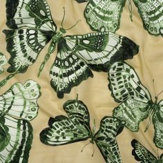 many green and white butterflies on a yellow background