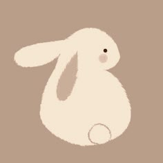 a white rabbit sitting on top of a brown background