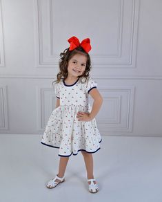 Serendipity Clothing Cherry Pie Charming Dress Style 23-36. Ready to ship! Sizing: Serendipity Clothing fits true to size. If you would like a personal measurement, please contact our shop at 214-517-0882. We offer matching bows & socks under accessories in our menu. Link: https://southernsweetchildren.com/collections/accessories Spring Dresses With Bow And Short Sleeves, Casual A-line Dress With Bow, Casual White Dress With Bow, Cute White Dresses With Bow Print, Casual Short Sleeve Dress With Bow, Playful Sleeveless Dress With Bow, Cute Short Sleeve Dress With Bow, White Sleeveless Dress With Bow Print, Summer Cotton Dresses With Bow Print