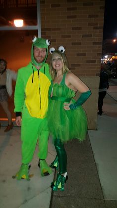 a man and woman dressed up as frog and princess in costume for the halloween party