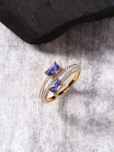 Check out our the exclusive collection of Tanzanite Solid 925 Sterling Silver Gold Plated Bypass Ring & choose the best one for you. Get Best Quality Products with Free Shipping Above $50, Easy Payment Plans & Easy Returns Policy. Buy Now before they go out for stock! #yotreasure #tanzaniterings #tanzanitejewelry #womenjewelry #gemstones Tanzanite Jewelry, Bypass Ring, Tanzanite Ring, Stylish Jewelry, Polish Jewelry, Ring Jewelry, White Topaz, Unique Colors, Solid 925 Sterling Silver