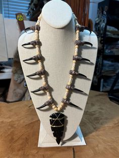 Replica eagle claw necklace with hand knapped obsidian heavy serrated point, resin claws, bone beads Handmade Black Claw Jewelry, Unique Hand Tooled Black Jewelry, Dark Shaman, Powwow Regalia, Wasteland Weekend, Claw Necklace, Eagle Claw, Arrow Head, Bear Necklace