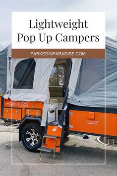 an orange and white camper with the words light weight pop up campers