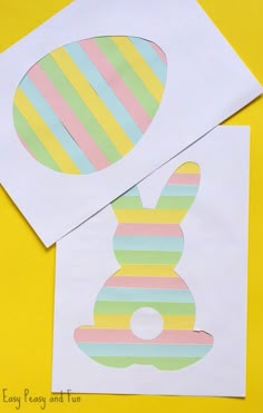 some paper cut out to look like an easter egg and bunny with stripes on it