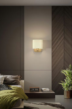 Introducing the elegant and durable Ella Wall Lamp. Made with high-quality brass material, it features a reinforced suction cup for added stability and a hand-woven fabric lampshade for a soft and beautiful light. With its modern and practical design, it is perfect for those with a tasteful eye for quality. Elevate your space with the unique and delicate touch of the Ella Wall Lamp.