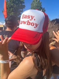 "Easy, Cowboy" red and white trucker hat featuring red writing! Perfect for summer time and country concerts! Any occasion! SnapBack hat so it's adjustable for multiple sizes. Cowboy Hat. Breathable material. Western wear, country concert! Visit my page for similar styles!  Feel free to message me with any questions and I'm sure we can work something out! Red Hip Hop Hat, One Size Fits Most, Red Hip Hop Hat One Size Fits Most, Red Flat Brim Hat For Country Events, White Trucker Hat For Summer Rodeo, Red Hats For Rodeo Spring Season, Red Hats For Rodeo In Spring, Red Hat For Rodeo Spring Season, Red Trucker Hat With Letter Print, Red Spring Rodeo Hat