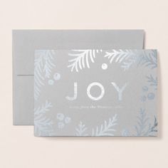 a card with the word joy printed on it and an envelope that says, simple silver joy holiday - by collemachle