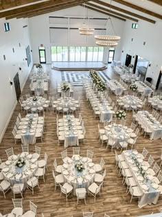 an overhead view of a banquet hall with tables and chairs set up for formal function