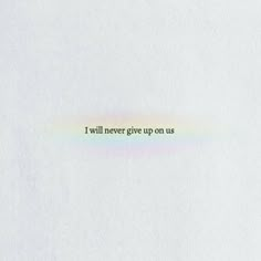 the words i will never give up on us are written in rainbow - colored ink